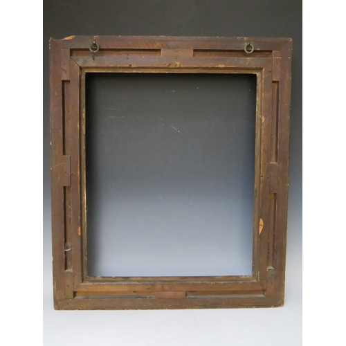 51 - A 19TH CENTURY DECORATIVE GOLD SWEPT FRAME, frame W 9 cm, rebate 62 x 51 cm