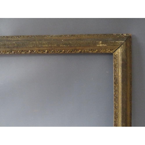 63 - A 19TH CENTURY GOLD FRAME, with designs to inner and outer edges, in need of some restoration, frame... 