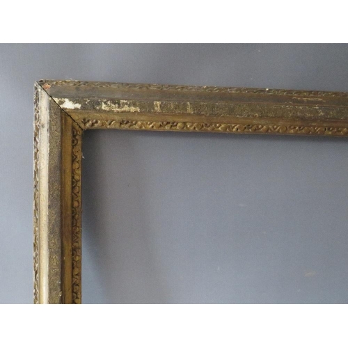 63 - A 19TH CENTURY GOLD FRAME, with designs to inner and outer edges, in need of some restoration, frame... 