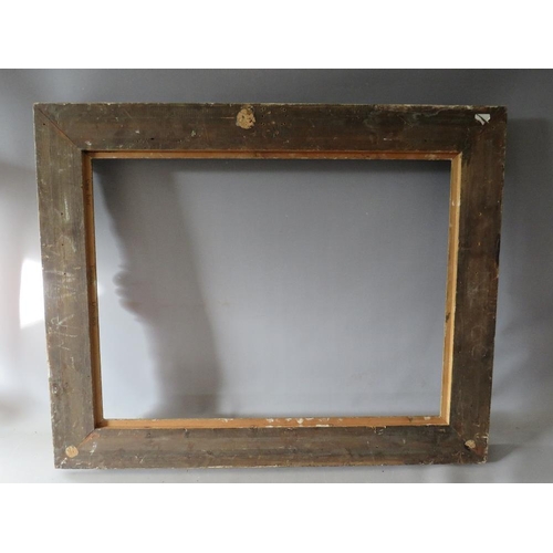 66 - A LATE 19TH / EARLY 20TH CENTURY DECORATIVE SWEPT GOLD FRAME, frame W 9 cm, rebate 62 x 47 cm