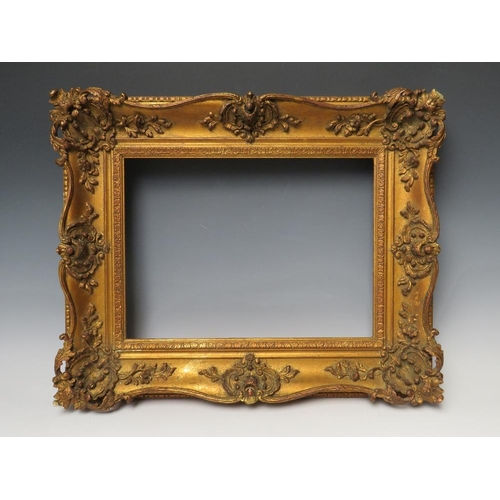 80 - A 19TH CENTURY GOLD SWEPT FRAME, frame W 9 cm, rebate 29 x 39 cm