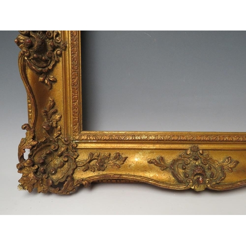 80 - A 19TH CENTURY GOLD SWEPT FRAME, frame W 9 cm, rebate 29 x 39 cm