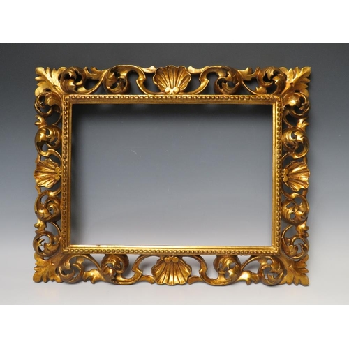 82 - A 19TH CENTURY CARVED WOODEN FLORENTINE GILT FRAME, frame W 7.5 cm, rebate 39 x 28 cm