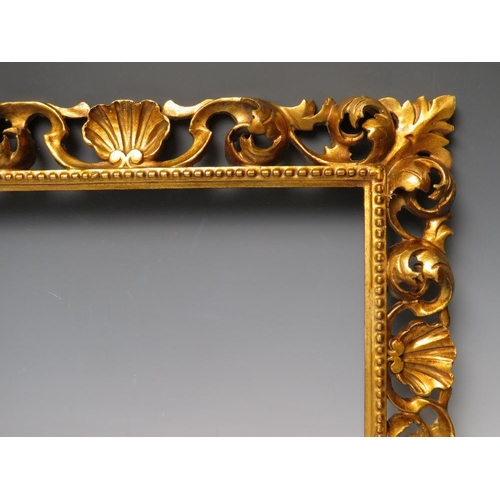 82 - A 19TH CENTURY CARVED WOODEN FLORENTINE GILT FRAME, frame W 7.5 cm, rebate 39 x 28 cm