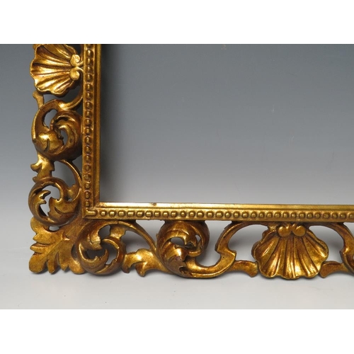 82 - A 19TH CENTURY CARVED WOODEN FLORENTINE GILT FRAME, frame W 7.5 cm, rebate 39 x 28 cm