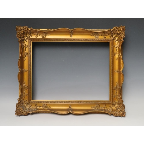 84 - A 19TH CENTURY GOLD SWEPT FRAME, frame W 6.5 cm, rebate 28.5 x 38 cm