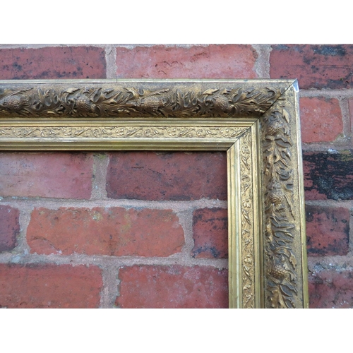 55 - A 19TH CENTURY GOLD FRAME WITH THISTLE DESIGN, frame W 9 cm, rebate 40 x 32 cm