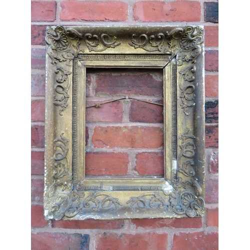 60 - A LATE 18TH / EARLY 19TH CENTURY DECORATIVE GOLD FRAME, with corner embellishments and gold slip, in... 