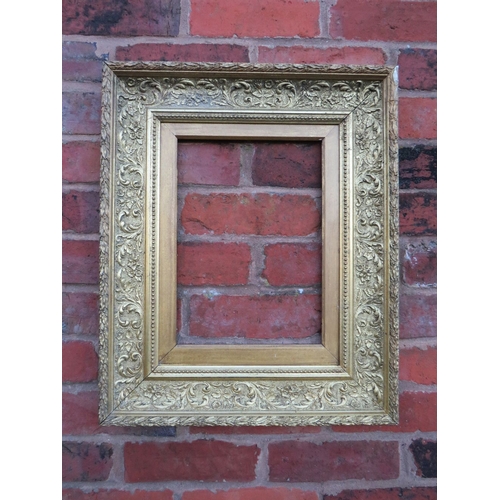 61 - A 19TH CENTURY GOLD FRAME WITH INNER LEAF DESIGN, acanthus leaf design to outer edge and gold slip, ... 