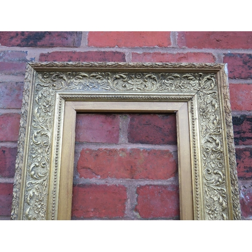 61 - A 19TH CENTURY GOLD FRAME WITH INNER LEAF DESIGN, acanthus leaf design to outer edge and gold slip, ... 