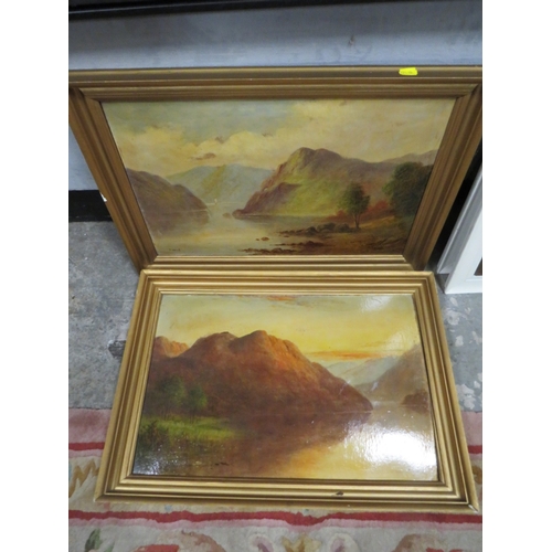 23 - A PAIR OF GILT FRAMED OIL ON BOARD PAINTINGS OF MOUNTAINOUS LAKE SCENES SIGNED T WOOD