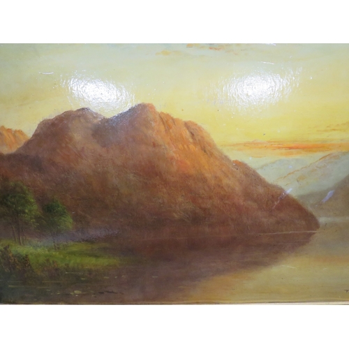 23 - A PAIR OF GILT FRAMED OIL ON BOARD PAINTINGS OF MOUNTAINOUS LAKE SCENES SIGNED T WOOD