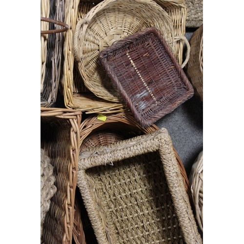 121 - AN ASSORTMENT OF WICKER BASKETS ETC