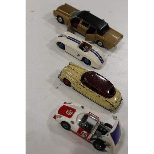 134 - TWO TRAYS OF MAINLY DINKY TOY CARS ETC