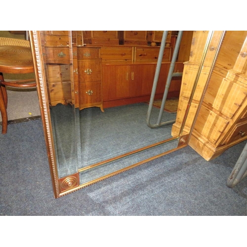 829 - A LARGE MODERN GILT FRAMED RECTANGULAR MIRROR 125 X 100 CM