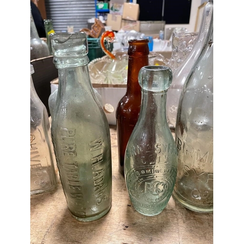 56 - A COLLECTION OF VINTAGE / ADVERTISING BOTTLES TO INCLUDE LOCAL EXAMPLES