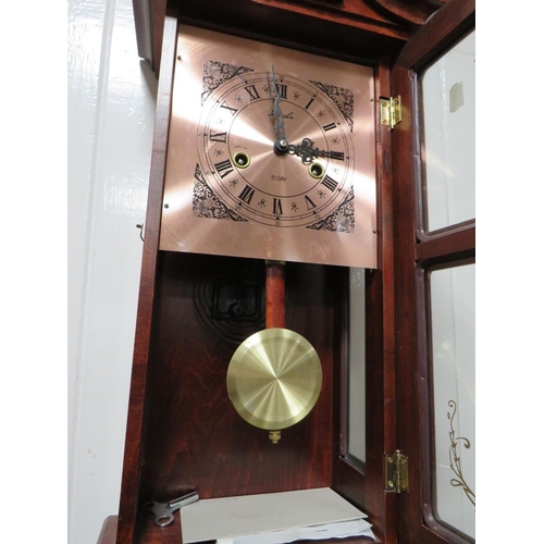 174 - A MODERN LINCOLN 31 DAY WALL CLOCK