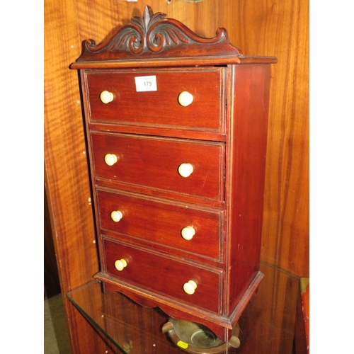 179 - A TABLE TOP / MINIATURE CHEST OF FOUR DRAWERS