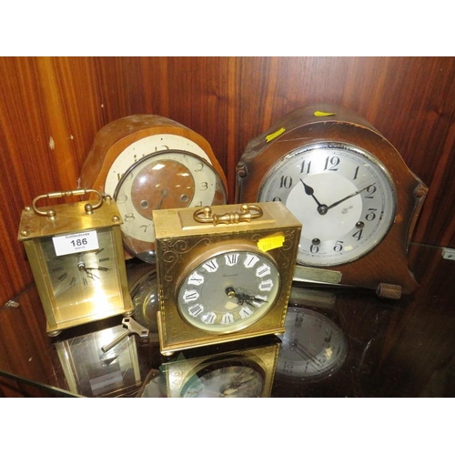 186 - FOUR ASSORTED MANTLE AND CARRIAGE CLOCKS