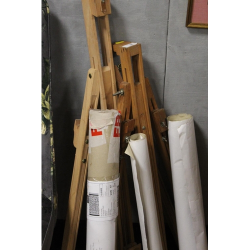 26 - TWO ARTIST EASELS TOGETHER WITH A SELECTION OF ROLLED POSTERS TO INCLUDE U2 ETC