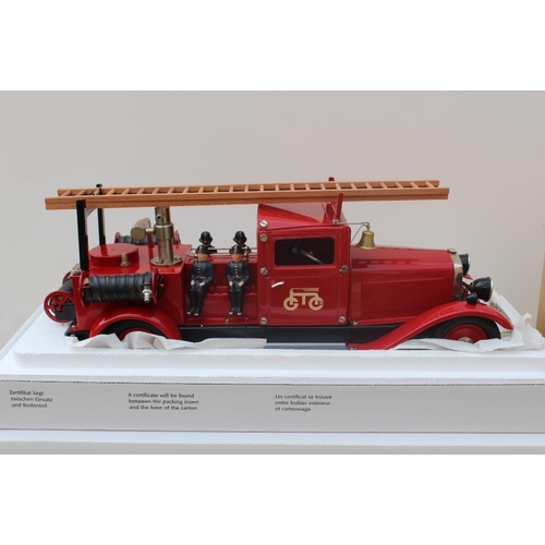 273 - MARKLIN - TWO BOXED DIE CAST VEHICLES, comprising Marklin Metall 19034 clockwork fire engine and Mar... 