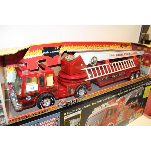 295 - A NYLINT METAL MUSCLE CLASSIC AERIAL 'HOOK-N-LADDER' No 540 MODEL FIRE ENGINE, together with a 1:18 ... 