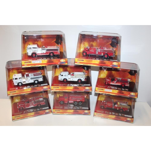 8 - EIGHT BOXED CORGI HEROES UNDER FIRE FIRE ENGINES, to include US53003, US52606, US53103, US53205, US5... 