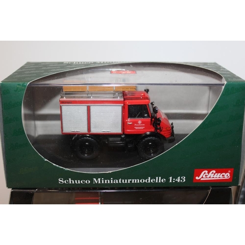 9 - FOUR BOXED SCHUCO MINIATURMODELLES, to include fire engines and tractor, together with three boxed S... 