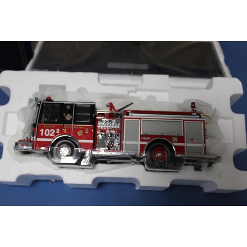 100 - FOUR BOXED CODE 3 FIRE ENGINES, to include 1:64 scale FDNY Seagrave Ladder Co.24, 1:64 scale Terryto... 