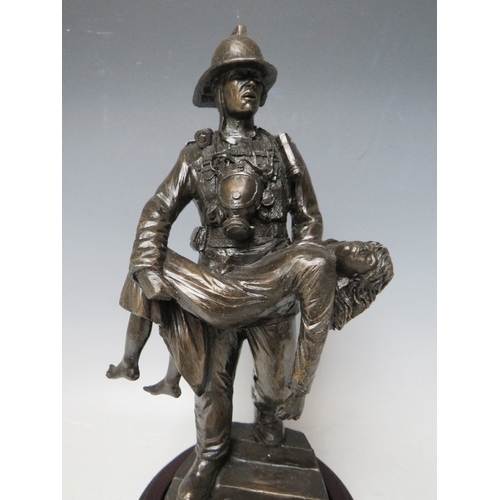 296 - A BALLANTYNES OF WALKERBURN MODERN RESIN FIREMAN WITH CHILD FIGURE