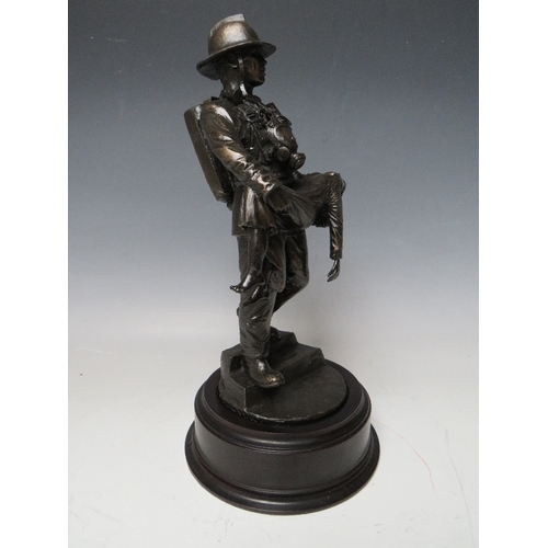 296 - A BALLANTYNES OF WALKERBURN MODERN RESIN FIREMAN WITH CHILD FIGURE