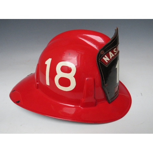 298 - A RED PLASTIC US NASHVILLE FIRE DEPARTMENT TOPGARD HELMET BY MSA, with hand painted number 18 on sid... 