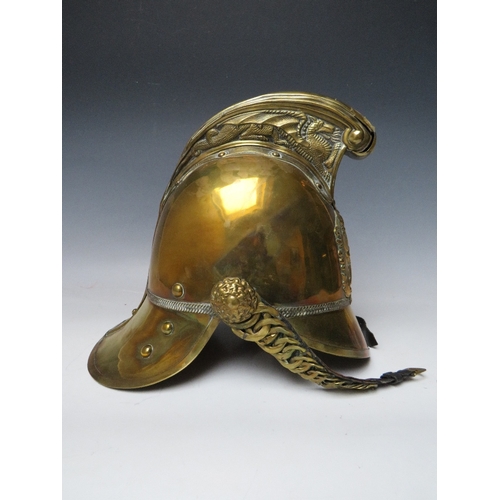 299 - A 19TH CENTURY MERRYWEATHER BRASS FIREMANS HELMET, standard issue with chin strap