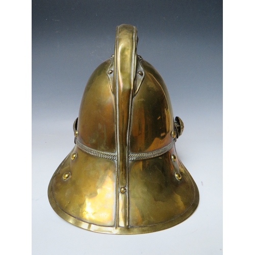 299 - A 19TH CENTURY MERRYWEATHER BRASS FIREMANS HELMET, standard issue with chin strap