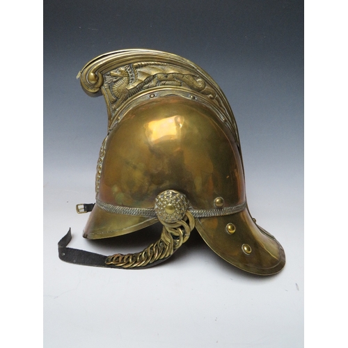 299 - A 19TH CENTURY MERRYWEATHER BRASS FIREMANS HELMET, standard issue with chin strap