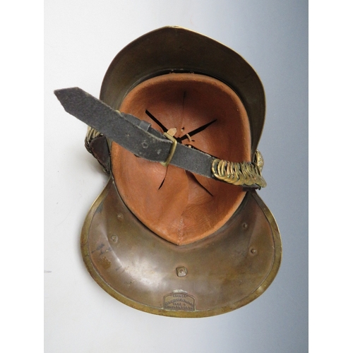 299 - A 19TH CENTURY MERRYWEATHER BRASS FIREMANS HELMET, standard issue with chin strap