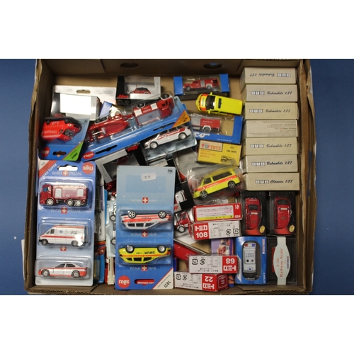 58 - A TRAY OF CARDED VEHICLES BY SIKU, Matchbox, Matel etc., together with a collection of boxed 1:87 sc... 