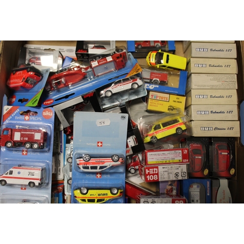 58 - A TRAY OF CARDED VEHICLES BY SIKU, Matchbox, Matel etc., together with a collection of boxed 1:87 sc... 