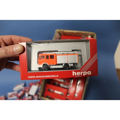 109 - CIRCA SEVENTY FIVE BOXED 1:87 SCALE FIRE ENGINES / FIRE SERVICE VEHICLES, mainly by Herpa, with some... 