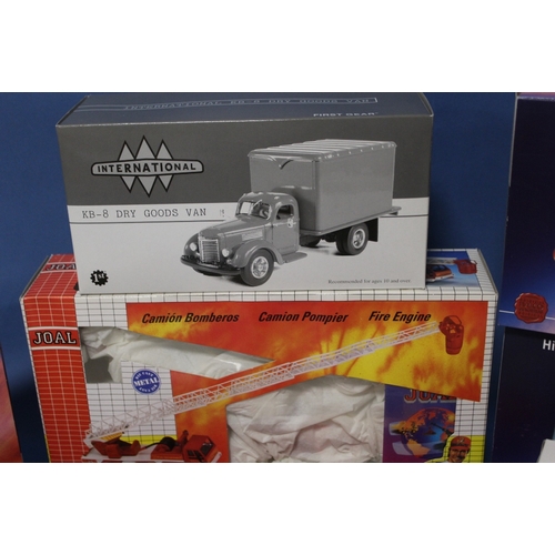 116 - TEN BOXED FIRE AND POLICE VEHICLES, to include First Gear 1:34 Dry goods Van, 3 x Iveco Magirus Fire... 