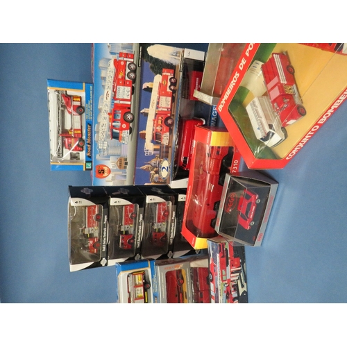 146 - SIXTEEN BOXED FIRE ENGINES, by Motormax, Vitese, Solido etc.