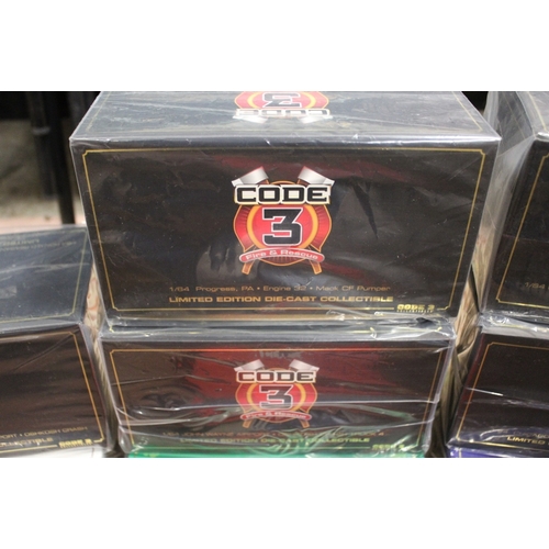 73 - NINE BOXED CODE 3 COLLECTABLES FIRE ENGINES / FLAGS FOR TRUCKS, to include John Wayne Airport Crash ... 