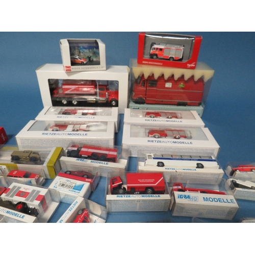 93 - A BOXED ELIGOR KENWORTH FIRE ENGINE 1:43 SCALE, Rietze Auto Modelle Mercedes L319 together with a la... 