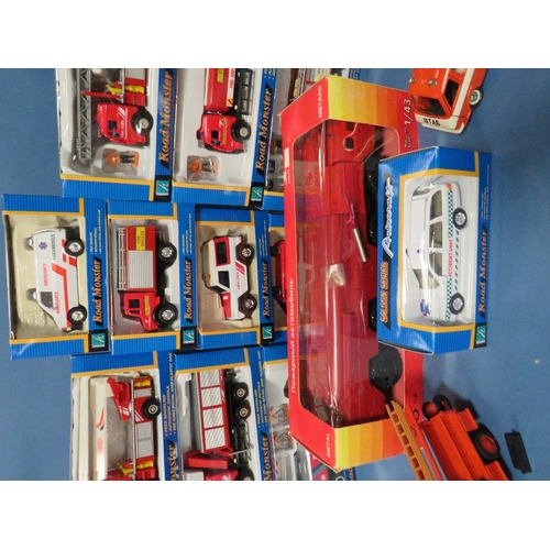 97 - ELEVEN BOXED AUTOCRAFT ROAD MONSTER EMERGENCY SERVICES VEHICLES, together with a Russian made MAZ731... 