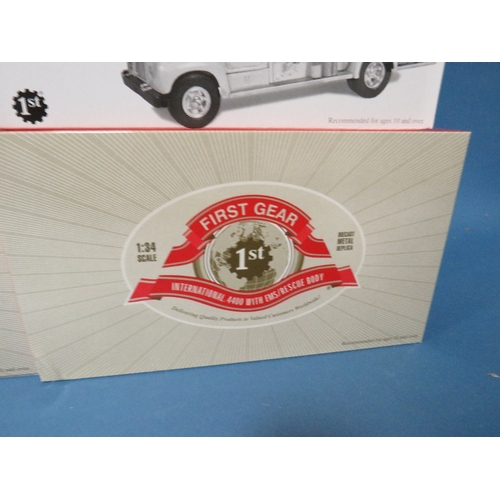 181 - EIGHT BOXED FIRST GEAR VEHICLES, all 1:34 scale, to include International KB8 fire truck, 1960 Mack ... 