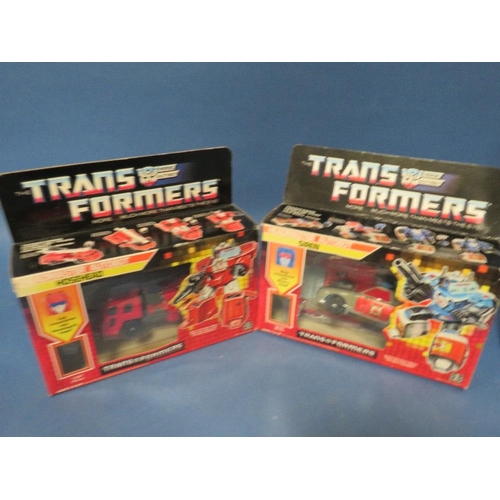 225 - THREE BOXED TRANSFORMERS, to include Siren, Horsehead and Inferno, two Majorette fire engines, two b... 