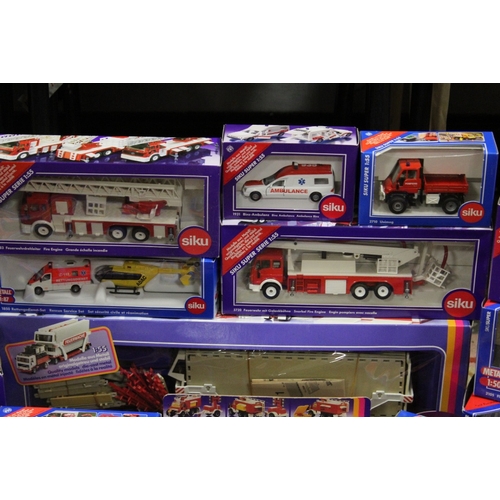 193 - TWENTY TWO BOXED SIKU VEHICLES, mostly fire related, mixed scales 1:50, 1:55, 1:87