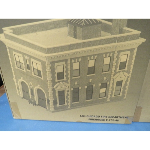 83 - FOUR BOXED CODE 3 COLLECTIBLES FIRE HOUSES, to include Chicago, Boston, Washington etc.