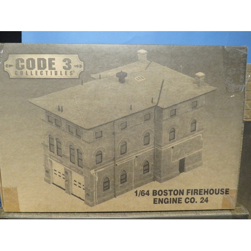 83 - FOUR BOXED CODE 3 COLLECTIBLES FIRE HOUSES, to include Chicago, Boston, Washington etc.