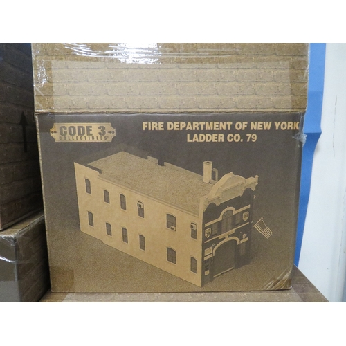 83 - FOUR BOXED CODE 3 COLLECTIBLES FIRE HOUSES, to include Chicago, Boston, Washington etc.